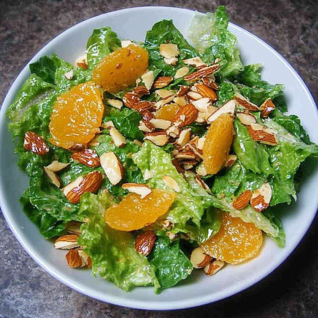 Recipe preparation for Mandarin Almond Lettuce Salad